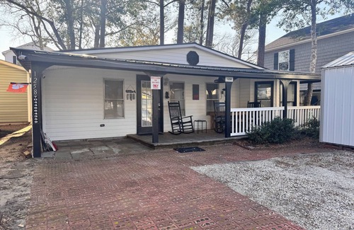Surfside Beach Cottage | Cozy beach cottage. Short walk to the beach! Family friendly.