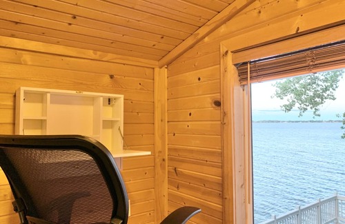 Hamlin County Cabin | Cozy beach front lake cabin with hot tub!