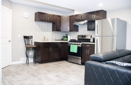 Calgary House | COZY BRAND NEW LEGAL SUIT IN LIVINGSTON CALGARY