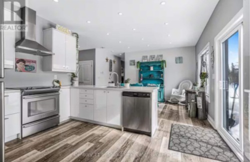 Miller Lake House | Cozy Bungalow - Steps from Lake Huron. Family & dog friendly