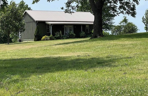 Maysville Cabin | Cozy Cabin, nestled on a 200 acre Horse Farm - family and pet friendly.