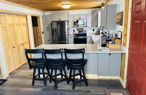 Blairsville Cabin | Cozy cabin on wooded acre, fire pit, games, fully equipped