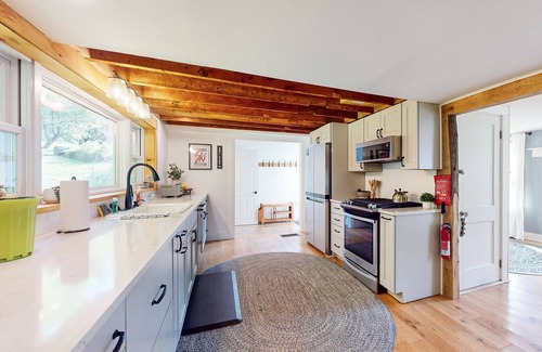 Waterville House | Cozy cabin w/mountain view, brook, dog-friendly, firepit, deck, wifi, TVs, BBQ
