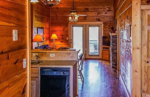 Spencer Cabin | Cozy cabin with fire pit, hot tub, and pool, and a swing set in the backyard!