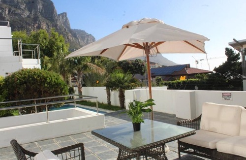 Camps Bay Ski Chalet | Cozy Camps Bay House With Mountain and sea View