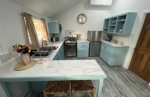 Rodney Bay Cottage | Cozy Caribbean Cottage only a stone’s throw away from beach!