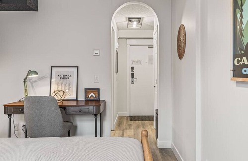 Canmore Apartment | Cozy Central Canmore- Light Industrial Hotel Room- very cool and comfortable ground-level room for 2, central, quick access to Banff
