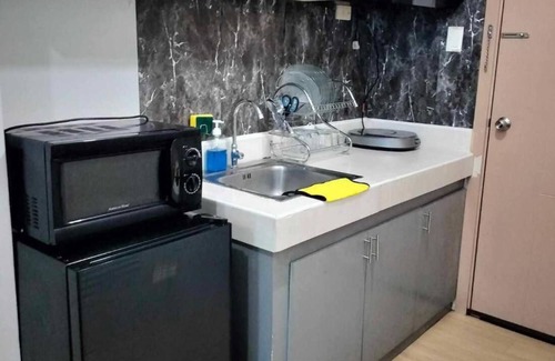 South Triangle Condo | Cozy City View Condo in Quezon City - Your Home Away From Home