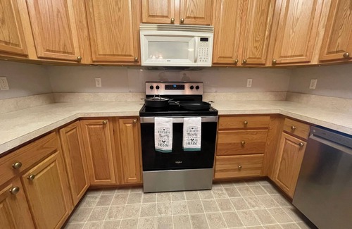 Milford Condo | Cozy condo, 30 minutes away from the beach, outlets and boardwalk.