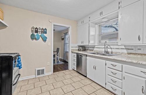 Blue Township House | Cozy Cottage Minutes From Stadiums + Parking and Fenced in Yard