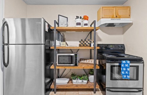 Blue Township House | Cozy Cottage Minutes From Stadiums + Parking and Fenced in Yard