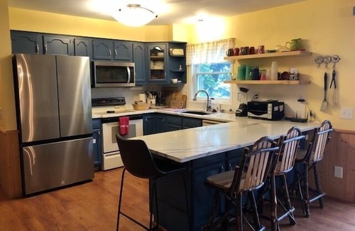 Baldwin Cottage | Cozy cottage on Big Star Lake with sunset views and family fun!