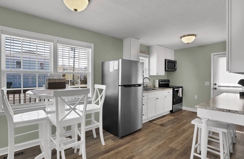Surf City Cottage | Cozy Cottage steps from the beach small pet friendly