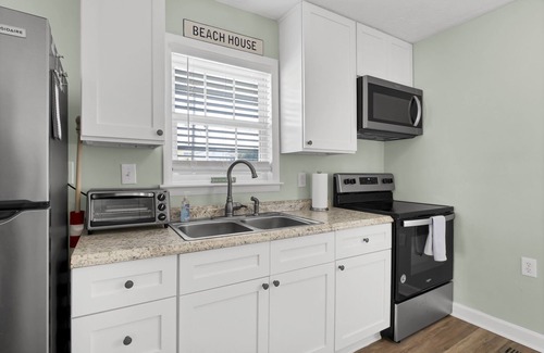 Surf City Cottage | Cozy Cottage steps from the beach small pet friendly