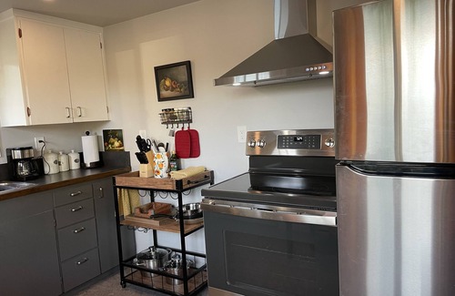 Langley Cottage | Cozy Cottage with deck within walking distance of Langley restaurants and shops.