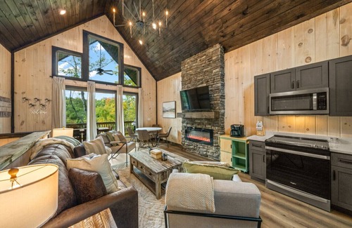 Sevierville Cabin | Cozy Cove Retreat w/Lake View, Hot Tub, FirePit!