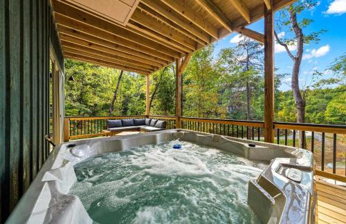 Sevierville House | Cozy Cove Retreat - Hot Tub - Lakefront - Family-Friendly Cabin