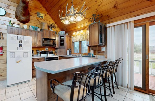 Greenville House | Cozy, dog-friendly waterfront cabin with large yard, porch, dock, & lake views