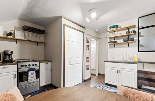 Grand Haven House | Cozy efficiency upper, a short walk downtown. Pet friendly with large backyard!