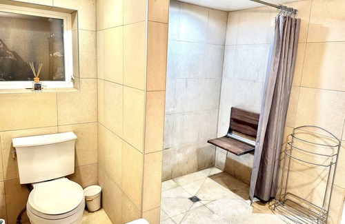 Grandview-Woodland House | Cozy Garden level suite with heated floors. 1 block off “The Drive”.