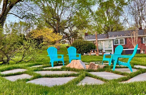 Mills River Cottage | Cozy home w/hot tub & huge fenced yard & firepit!