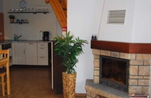 Muritz House | Cozy house with a fireplace and a large garden