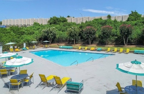 Loring Heights Apartment | Cozy King Bed w/ comfortable sleeper sofa and “Free Parking” awaits you!