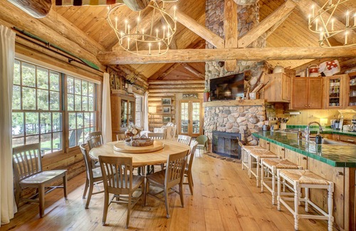 Spooner Cabin | Cozy Lake front luxury, hot tub, ice fish, snowmobile, fireplace, screened porch