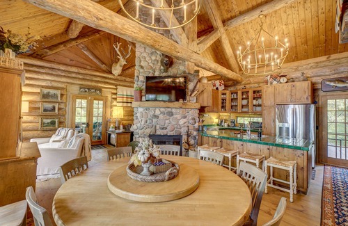 Spooner Cabin | Cozy Lake front luxury, hot tub, ice fish, snowmobile, fireplace, screened porch