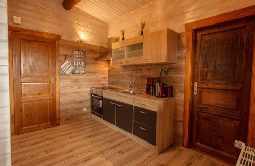 Steina House | Cozy log cabin with 2 apartments on a slope in a quiet location