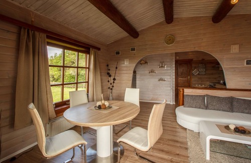 Steina House | Cozy log cabin with 2 apartments on a slope in a quiet location