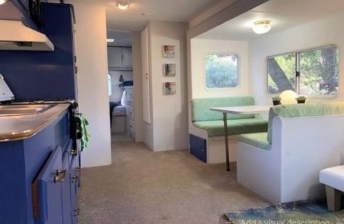 Topanga House | Cozy Mallard RV. Light, bright and inspiring trailer amongst the Pine trees.
