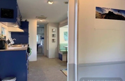 Topanga House | Cozy Mallard RV. Light, bright and inspiring trailer amongst the Pine trees.