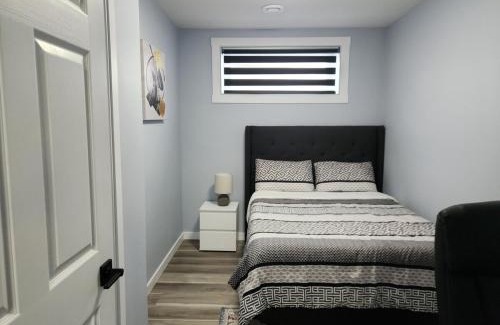 Regina Apartment | Cozy newly built basement suite