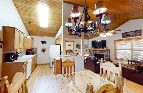 Reeds Spring Cabin | Cozy one-level cabin with pool, grill, fireplace, WiFi, & covered deck