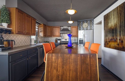 Parma House | Cozy, pet friendly, Mid-Century style home loaded with books, movies, games.