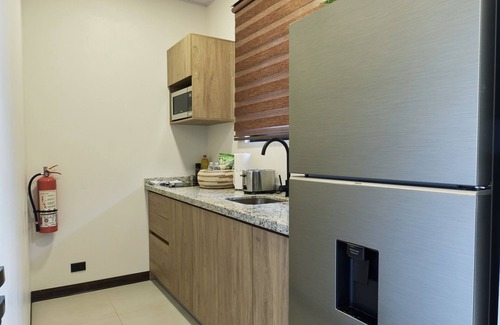 Arenal Hot Springs Apartment | Cozy private studio with jacuzzi, kitchen, best location, volcano view