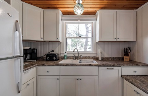 Southern Coast Cottage | Cozy, remodeled cottage with a private path to the beach, and a huge yard, nestled in the pines!