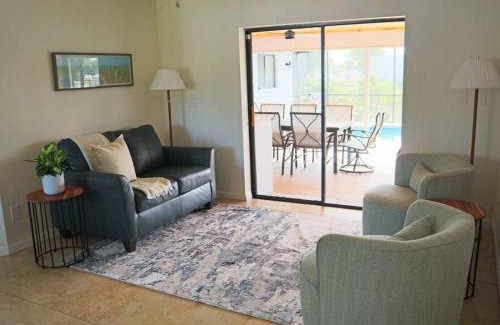 Fort Myers House | Cozy Retreat, heated pool, water canal, bikes,3 bedroom