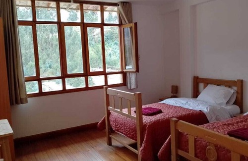 Independencia Bed & Breakfast | cozy room With garden view.