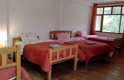 Independencia Bed & Breakfast | cozy room With garden view.