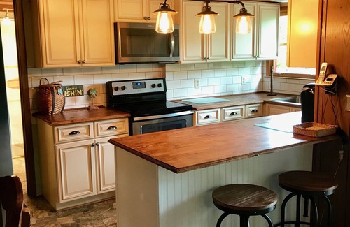Big Creek Cabin | Cozy, Rustic A Frame on Big Creek Sleeping 8-10 Guests