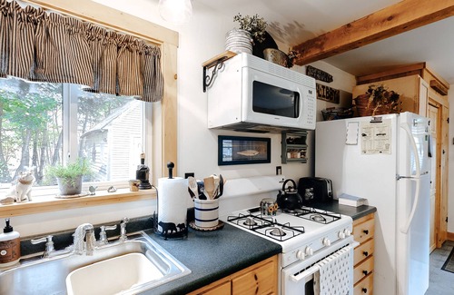 Shirley Mills House | Cozy & secluded getaway w/ a full kitchen & firepit - walk to the lake