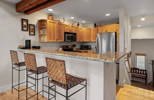 Saddle Ridge Condo | Cozy Ski In/Out Condo! Private Patio ,Hot Tub, + Grill!