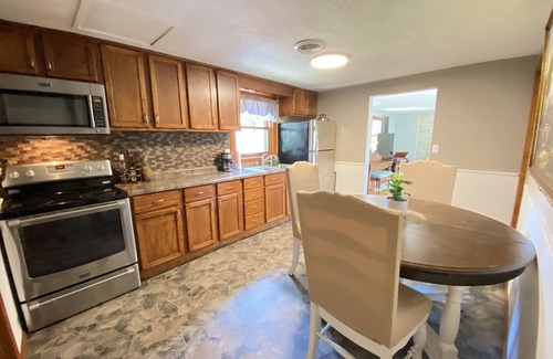 Rib Mountain House | Cozy Ski retreat under 2 miles from Granite Peak. Pet and family friendly