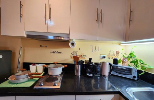 Pinagsama Apartment | Cozy Studio Interconnected to The Grand Canal Mall FREE PARKING ON PREMISE