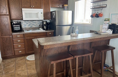 Holly Beach House | Cozy studio walking distance to the beach, Seas the Day Beach House