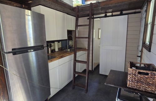 Millcreek Apartment | Cozy Studio with a large deck shaded by trees. Access to the pool and hot tub.
