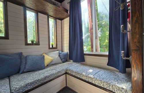 Millcreek Apartment | Cozy Studio with a large deck shaded by trees. Access to the pool and hot tub.