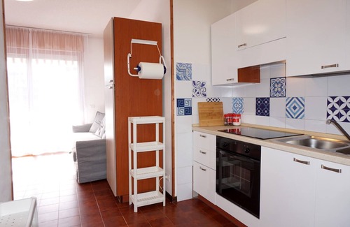 Porto Santa Margherita Apartment | Cozy Studio With Shared Pool